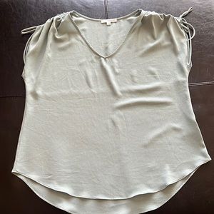 Mint green blouse. Size is XL but runs like a Large